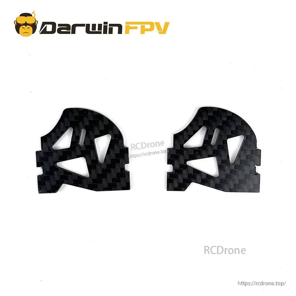 Two carbon fiber camera/side plates with triangular cutouts and mounting tabs