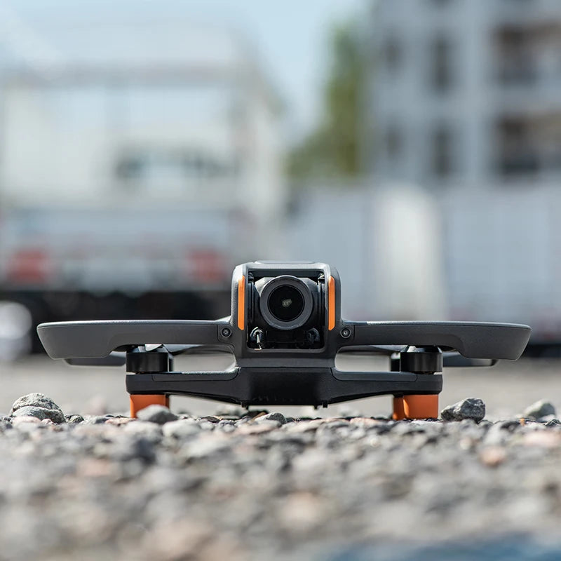 DJI Avata 2 Foot Pads, A silicone propeller guard for DJI Avata 2 drone, compatible with STARTRC ST-1144444, made of orange silica gel material.