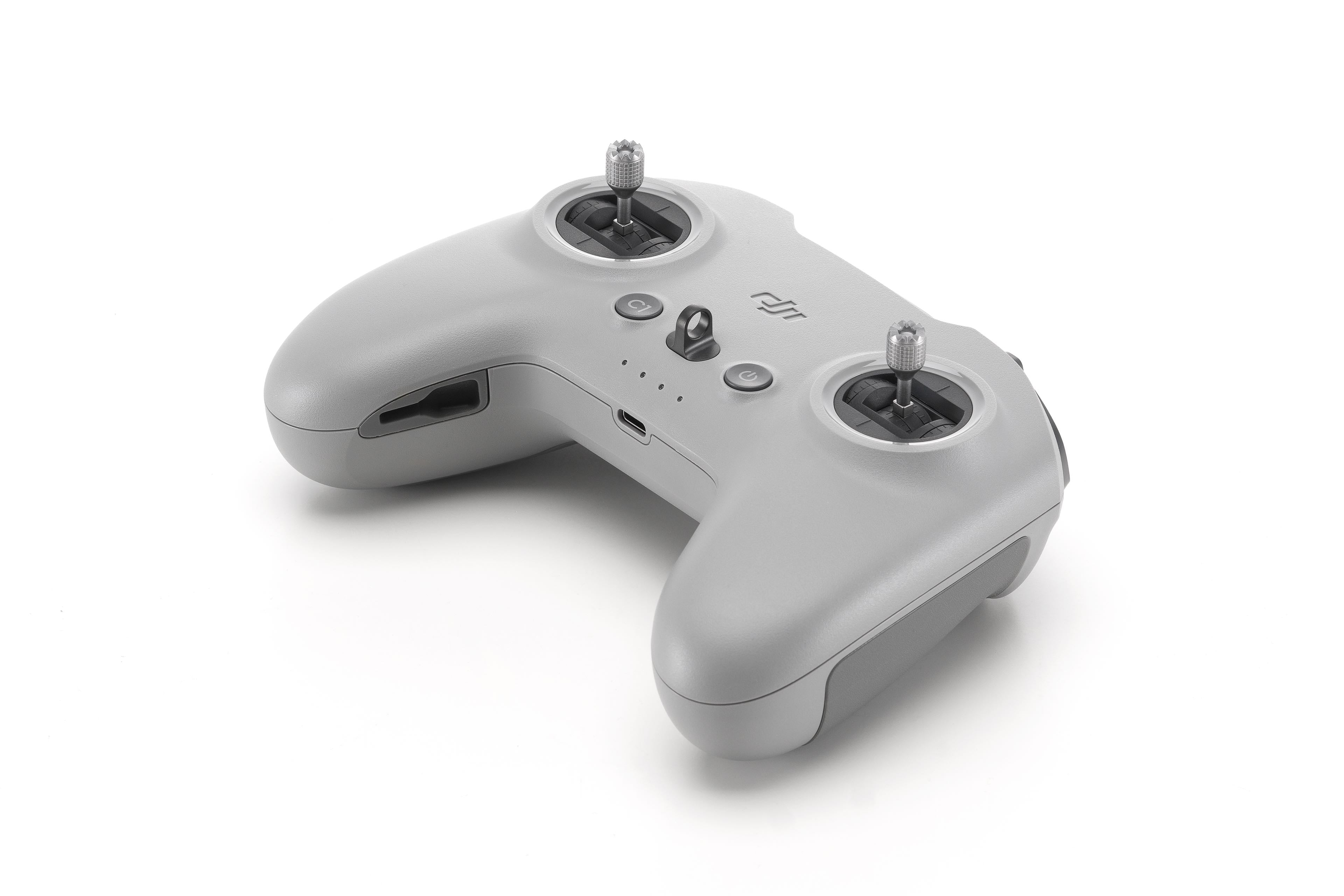 DJI FPV Remote Controller, The controller features extended control sticks for precision flying, supporting single and dual-fingered operation.