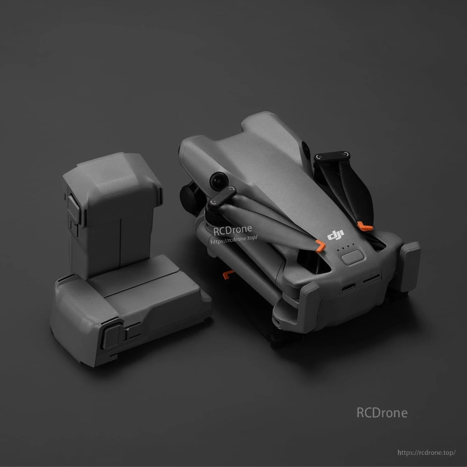 DJI Mini 5 Pro Intelligent Flight Battery, DJI Mini-series drone folded next to an intelligent flight battery pack on a dark background