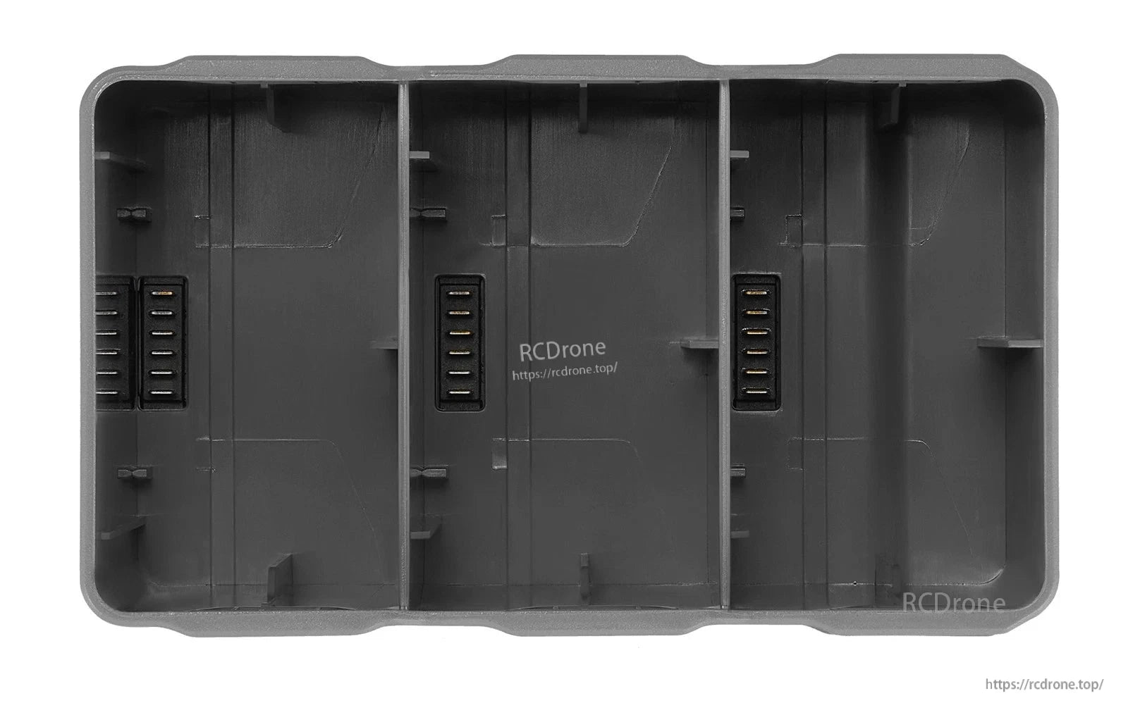 DJI Mini 5 Pro two-way charging hub interior with three battery bays and contact pin connectors