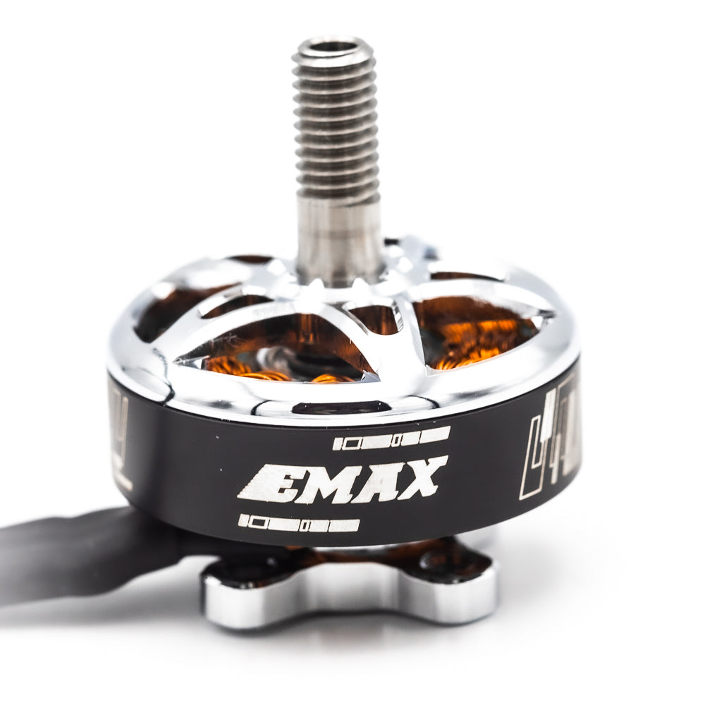 EMAX RSIII motor close-up showing EMAX logo band, chrome bell and copper windings