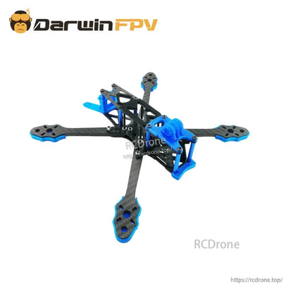 Angled view of assembled carbon fiber quad frame with blue TPU front camera mount and rear bracket