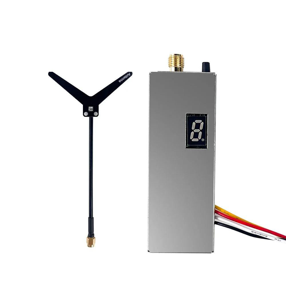 FPV VTX kit contents showing transmitter unit and Y-shaped antenna side by side
