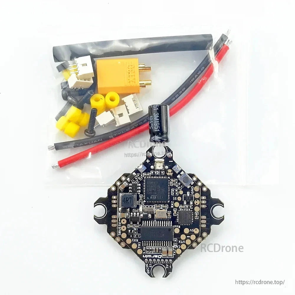 Package contents: DarwinFPV AIO FC board with capacitor, XT30 pigtail, wires, plugs, and gummies