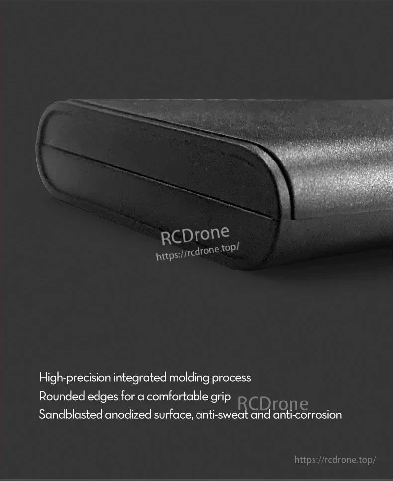 Close-up of screwdriver bit kit case end cap, showing rounded edge design and textured metal finish
