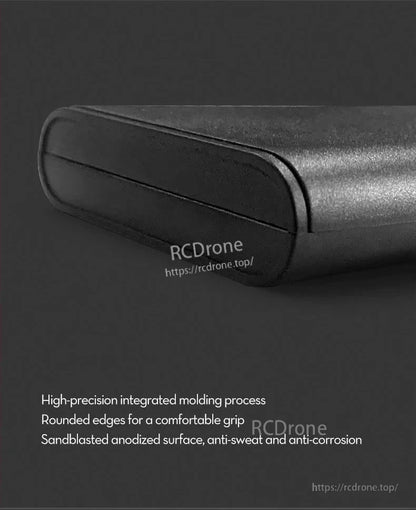 Close-up of screwdriver bit kit case end cap, showing rounded edge design and textured metal finish