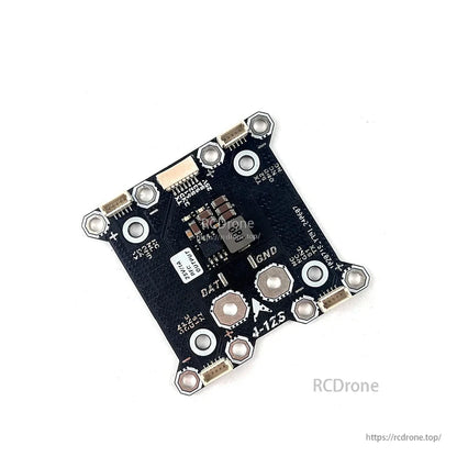 Angled view of DarwinFPV 25V BEC PDB showing regulator components, JST connectors, and mounting holes