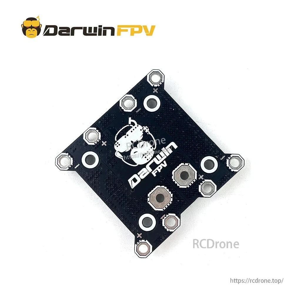 Angled rear view of Darwin FPV board with logo side, corner mounting holes, and solder pad positions