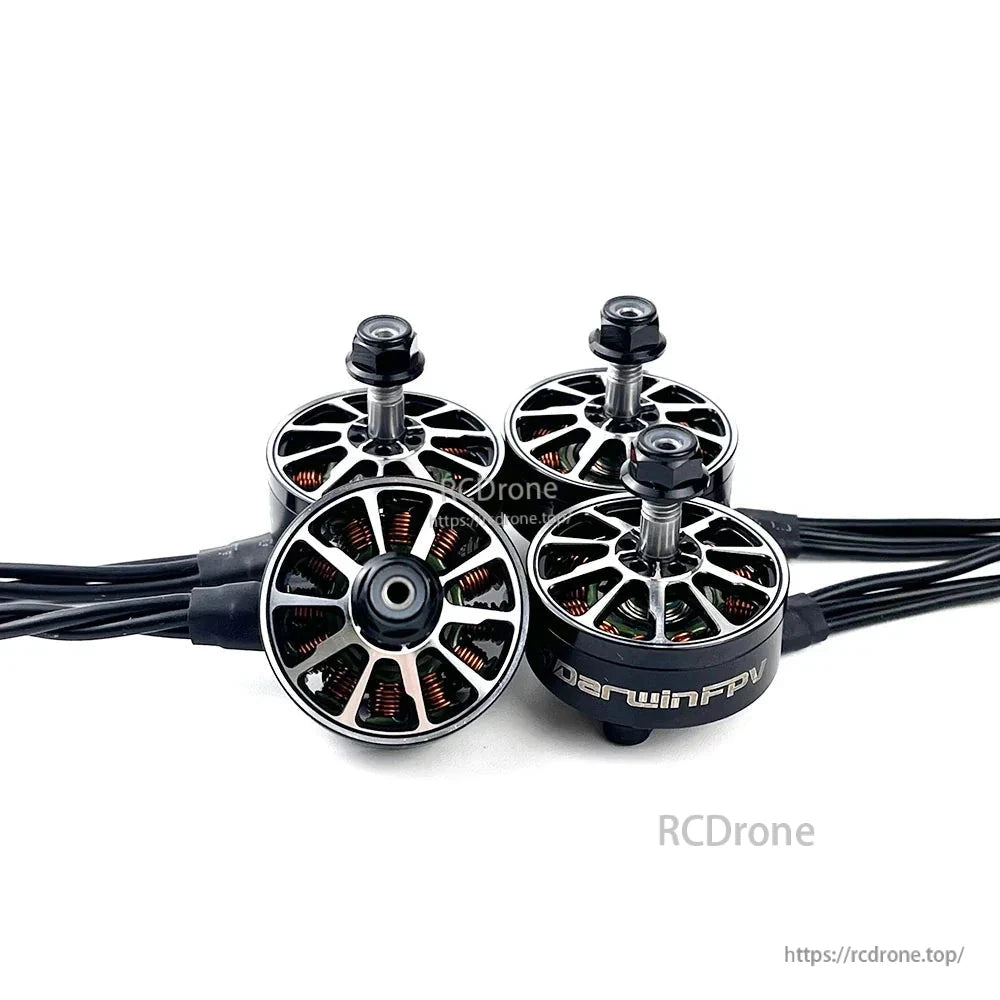 Four DarwinFPV 2807 brushless motors grouped together showing top caps and exposed windings