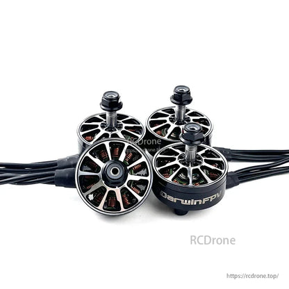 Four DarwinFPV 2807 brushless motors grouped together showing top caps and exposed windings