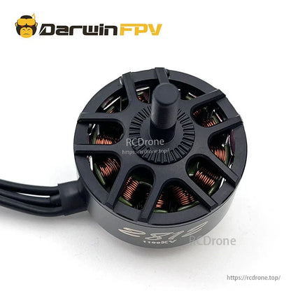 Top view of 2812 1100KV motor bell with vented spokes, centered shaft and attached lead wires