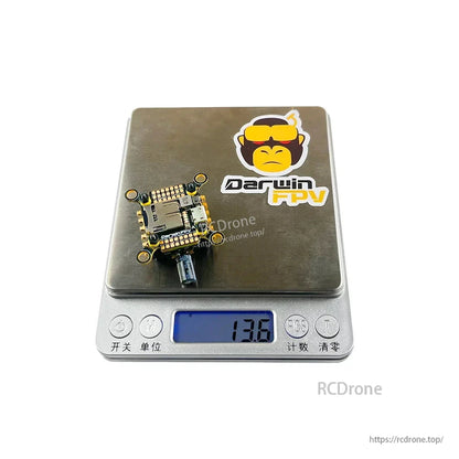 FC/ESC stack on digital scale showing 13.6 g weight display