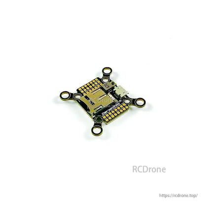 Wide top view of the stack showing SD card slot, corner mounting holes, and gold solder pad grid