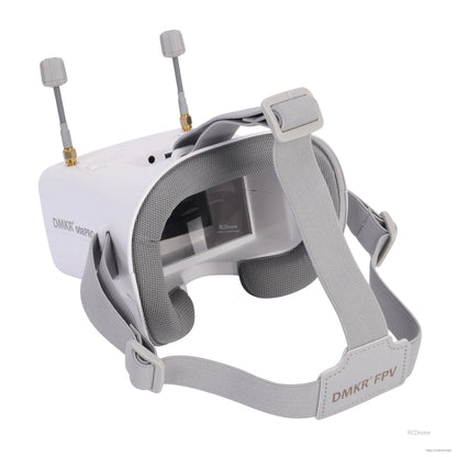Rear view of goggles showing wide elastic head strap, buckle adjusters, and eyepiece opening