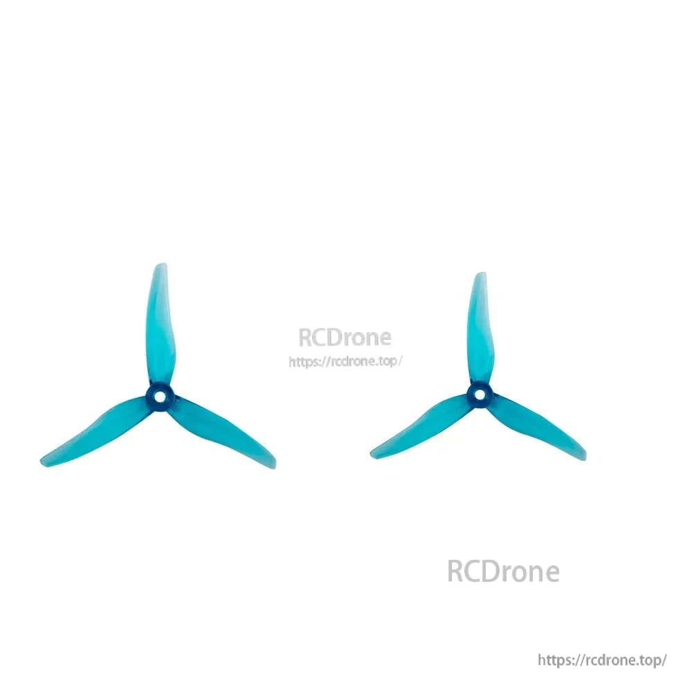 Two teal 3-blade propellers shown side by side, tri-blade profile on white background