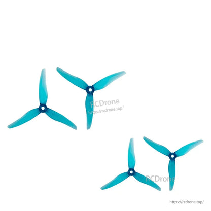 Four teal tri-blade propellers arranged at different angles to show blade shape