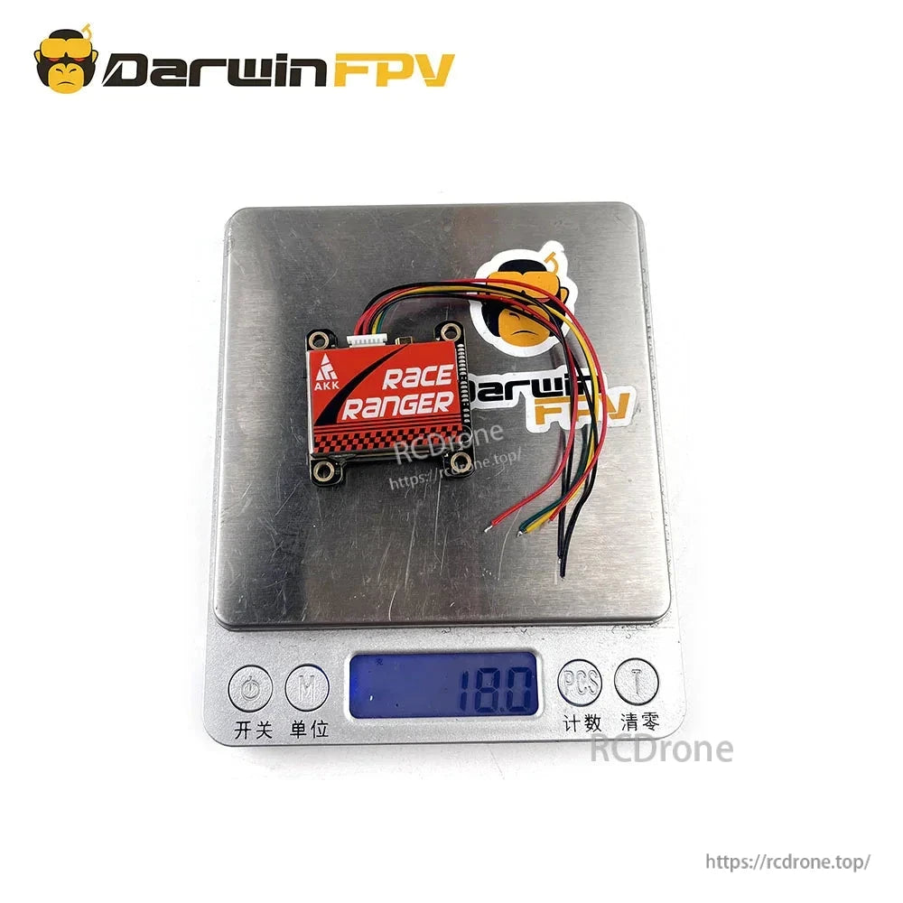 AKK Race Ranger VTX on digital scale showing 18.0 reading with wire harness attached