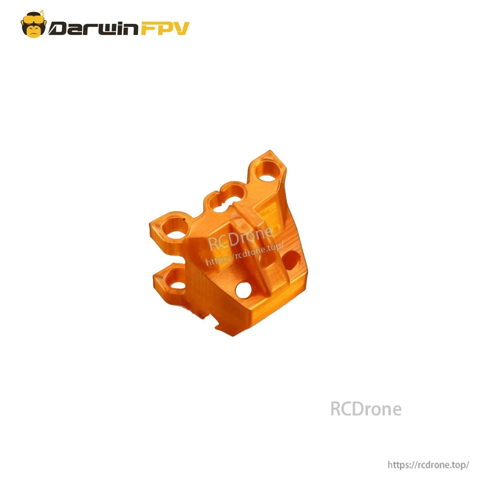 Orange aluminum camera mount bracket with multiple screw holes, angled view