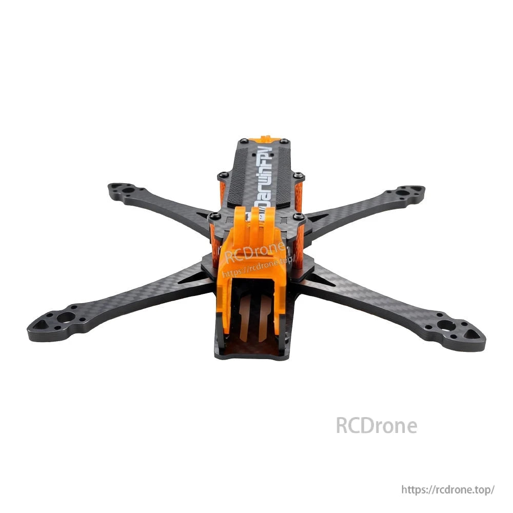 Front view of carbon fiber frame showing orange TPU nose mount and stack standoffs