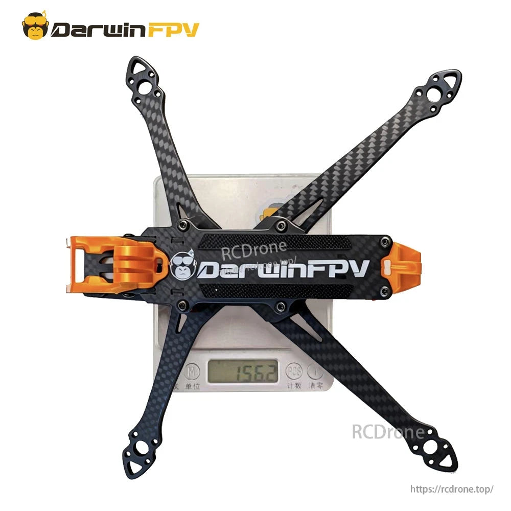 Top view of the frame sitting on a digital scale, showing overall footprint and arm spacing