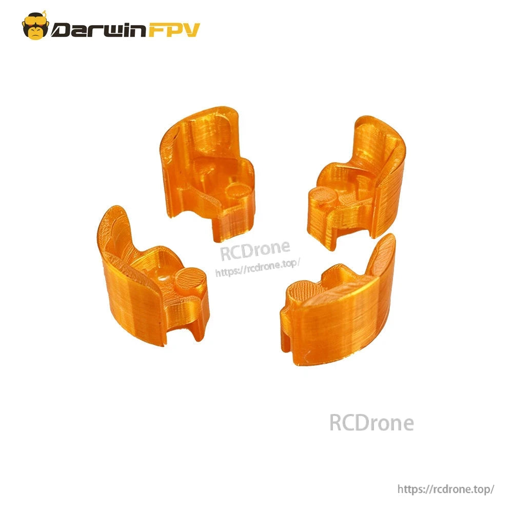 Set of four orange TPU arm protectors or bumpers included with the FPV frame kit