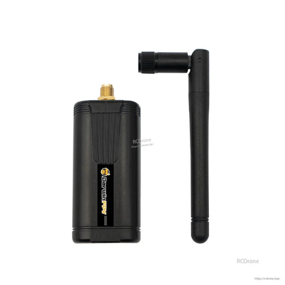 Black radio module with screw-on antenna shown side by side on white background