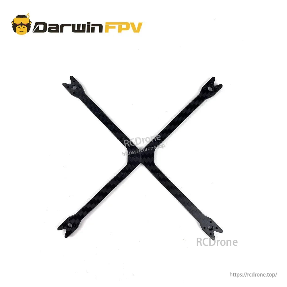 X-shaped carbon fiber arm plate showing woven finish and motor mounting holes, BabyApe V2