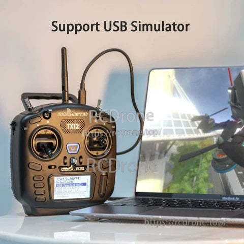TX12 Mark II transmitter connected to a laptop for USB simulator practice, with FPV flight sim on screen