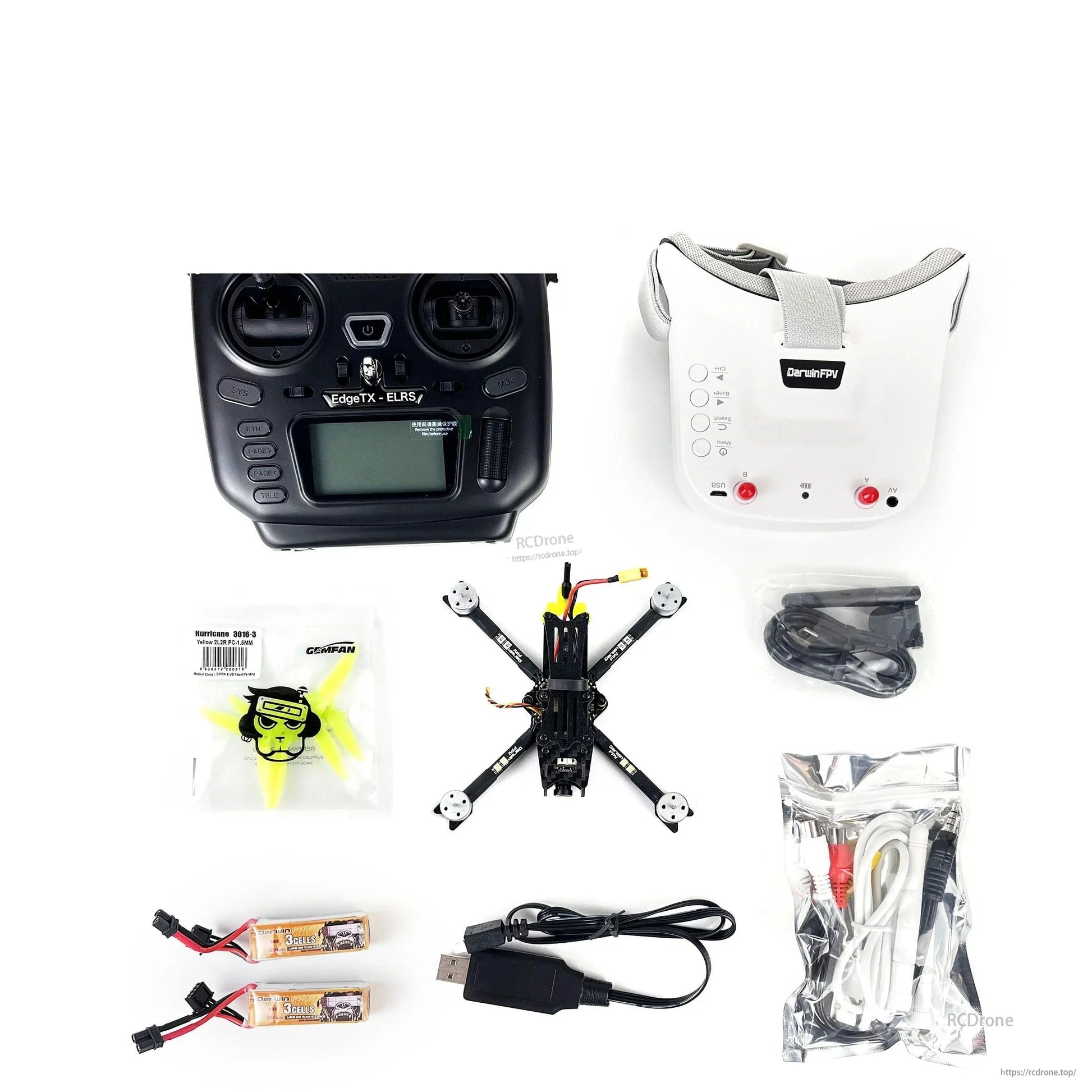 DarwinFPV kit bundle layout showing controller, goggles, mini quadcopter, battery pair, charger lead and accessory cables