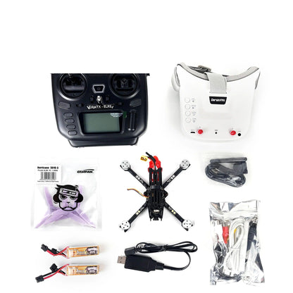 RTF FPV kit contents: radio controller, FPV goggles, quadcopter frame, two batteries, USB charger and AV cables