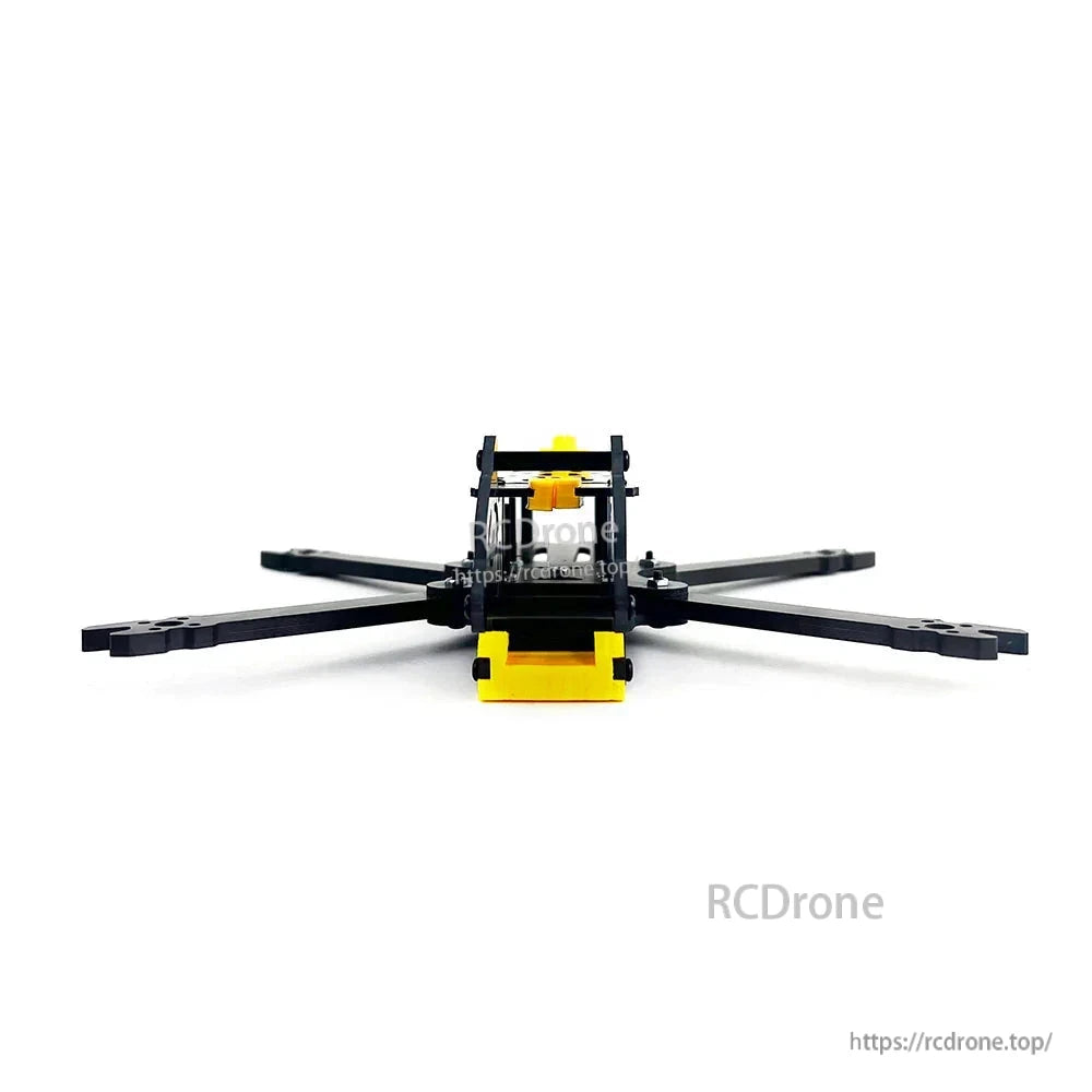 Rear view of BabyApe II carbon fiber frame with yellow rear bumper and top plate standoffs