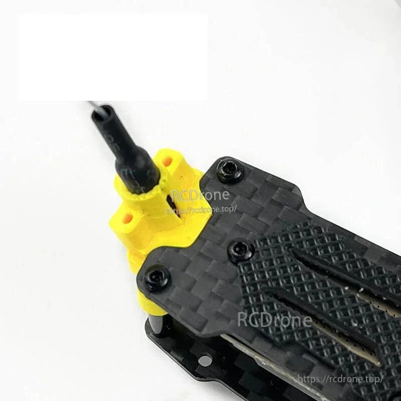 Rear antenna mount close-up with yellow TPU base and upright antenna