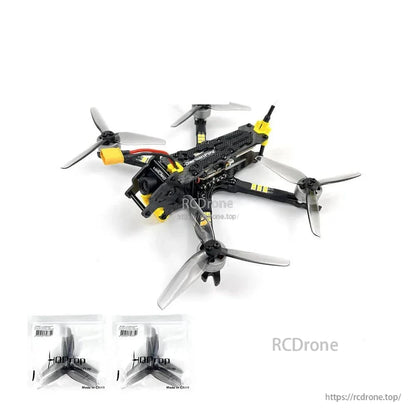 Drone with two spare propeller sets included, displayed below the quadcopter