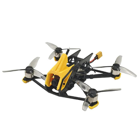 DarwinFPV FPV quadcopter with yellow camera canopy, carbon frame, and four tri-blade propellers