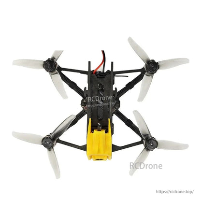 DarwinFPV FPV drone top-down view showing X-frame layout, four motors, and tri-blade propellers