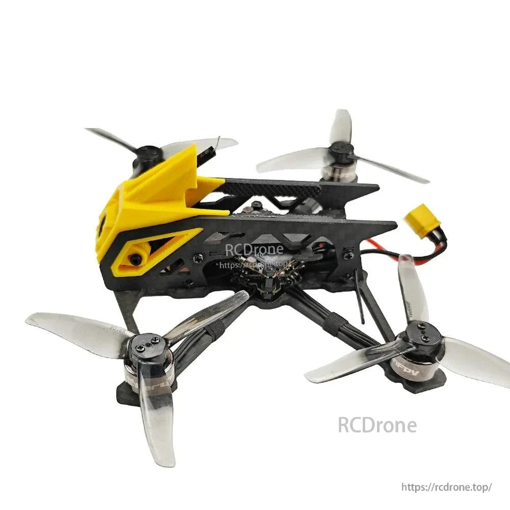 DarwinFPV FPV quad side profile showing yellow canopy, side cutouts, and exposed electronics stack