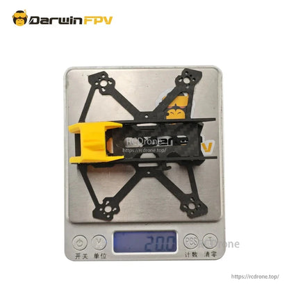 BabyApe III Mini frame weight shown on digital scale, 20.0 g reading