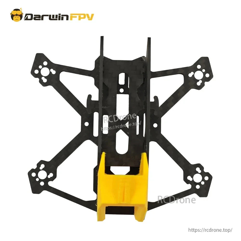 Top view of assembled BabyApe III Mini frame showing arm layout and center stack mounting slots