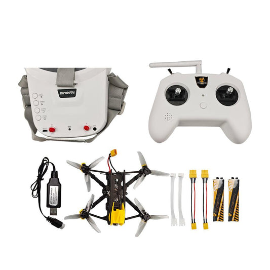 DarwinFPV FPV drone kit with goggles, radio controller, charger, batteries, and cables on white