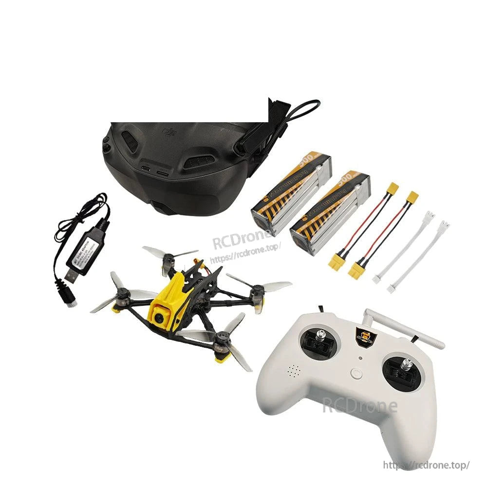 FPV quadcopter front camera view with headset, controller, charger, batteries, and XT-style power leads