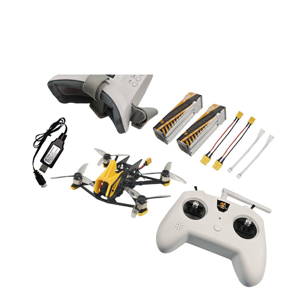FPV drone kit angled layout showing headset, controller, quadcopter, batteries, charger, and leads