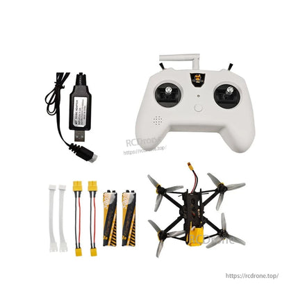 DarwinFPV kit components laid out: radio controller, quadcopter, charger, batteries, and adapter cables