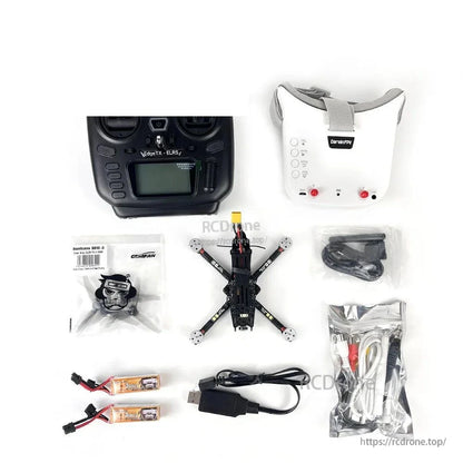 FPV drone kit layout with radio transmitter, FPV goggles, quadcopter, batteries, USB cable, and accessories