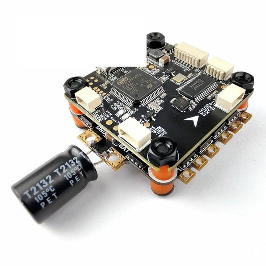 DarwinFPV Betaflight F4 flight controller board with soft mounts and external electrolytic capacitor