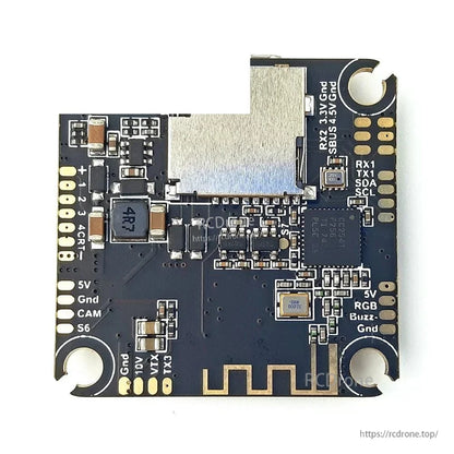 Back side of flight controller with solder pad labels for 5V, CAM, RX1/TX1, SDA/SCL, RGB, buzzer