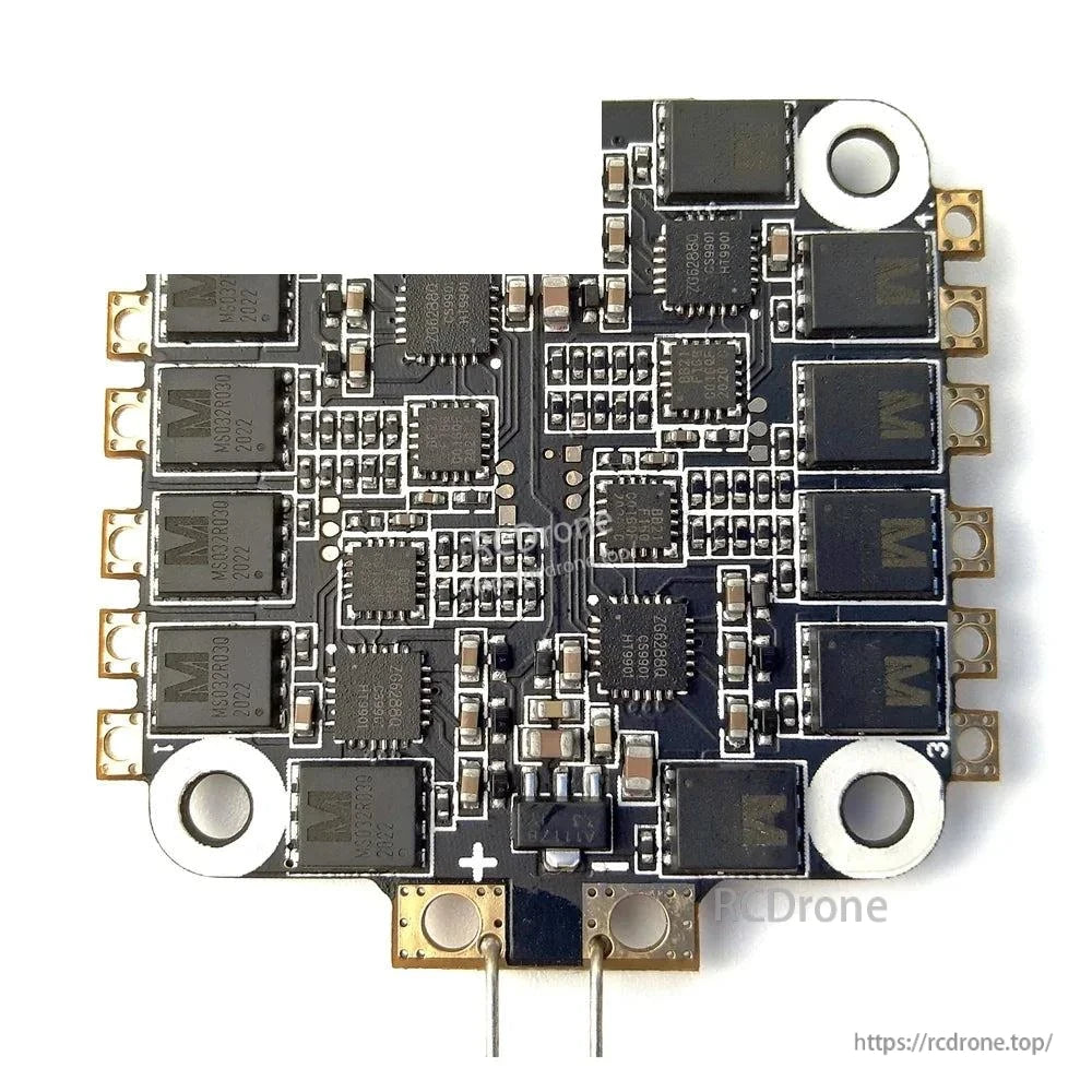 Component-side view of 4-in-1 ESC board with MOSFETs, driver chips, and power leads