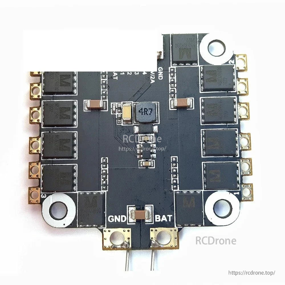 4-in-1 ESC close-up showing BAT and GND power pads and 4R7 inductor