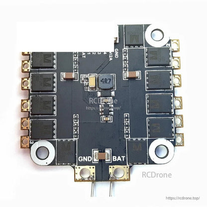 4-in-1 ESC close-up showing BAT and GND power pads and 4R7 inductor