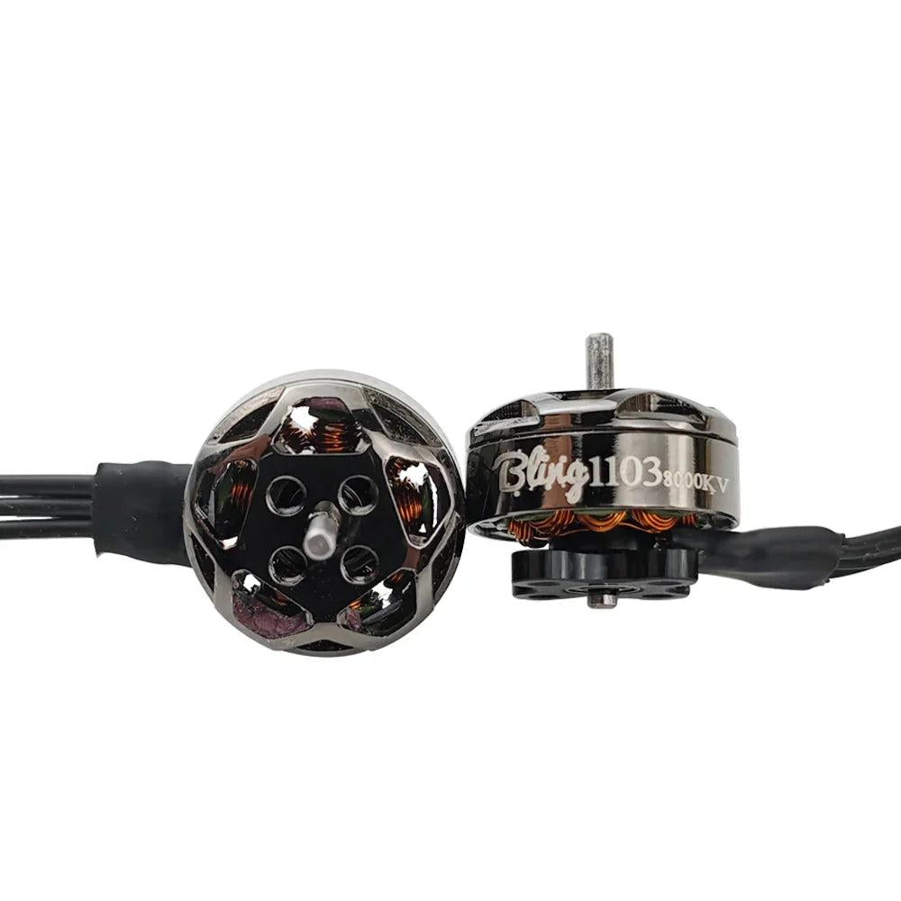 Top and side view of Bling 1103 motor showing rotor bell vents, shaft, and copper windings